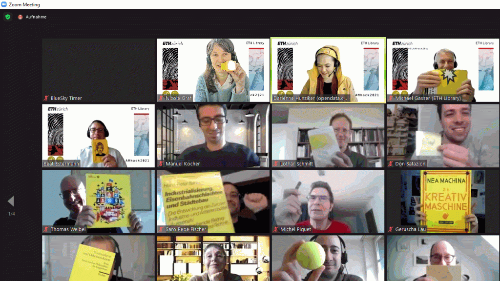 Hackathon participants showing yellow objects to the camera